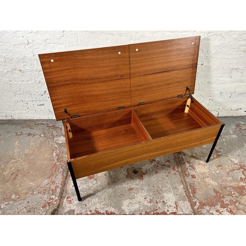 143 - A mid 20th century teak and black metal two section sewing table - approx. 35cm high x 92mc wide x 3... 