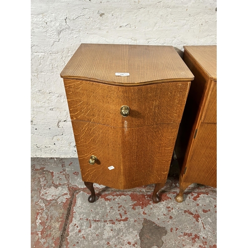 146 - Three mid 20th century bedside cabinets with cabriole supports, two oak and one walnut - all approx.... 