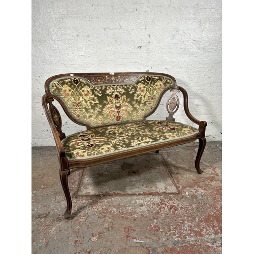 63 - An Edwardian inlaid rosewood and floral upholstered two seater parlour sofa - approx. 80cm high x 11...