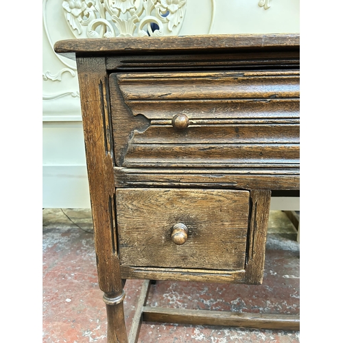 68 - A Goodalls of Manchester oak writing desk - approx. 77cm high x 107cm wide x 53cm deep