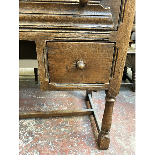 68 - A Goodalls of Manchester oak writing desk - approx. 77cm high x 107cm wide x 53cm deep