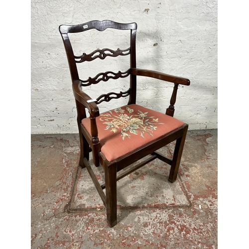 74 - A Georgian Chippendale style mahogany carver dining chair with floral upholstery - approx. 96cm high... 