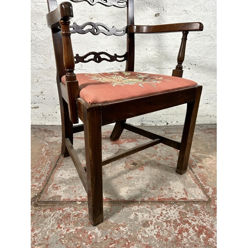 74 - A Georgian Chippendale style mahogany carver dining chair with floral upholstery - approx. 96cm high... 