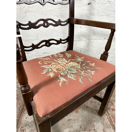 74 - A Georgian Chippendale style mahogany carver dining chair with floral upholstery - approx. 96cm high... 