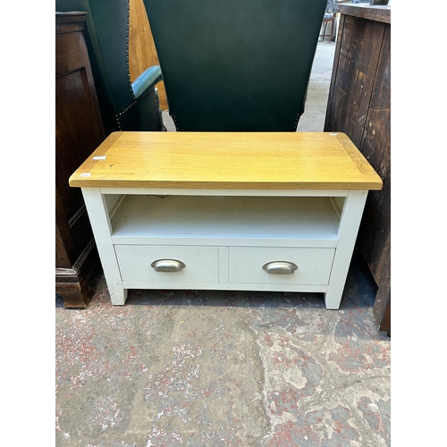 81 - A modern oak and white painted TV stand