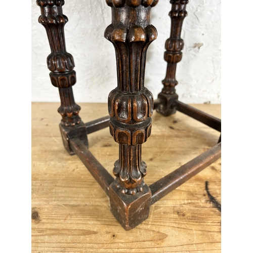 82 - A Heaton Tabb & Co. Ltd. carved oak rectangular joint side table - approx. 47cm high x 43cm wide x 3... 