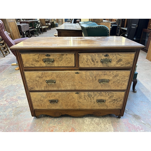 83 - An Edwardian walnut chest of two short over two long drawers - approx. 85cm high x 107cm wide x 49cm... 