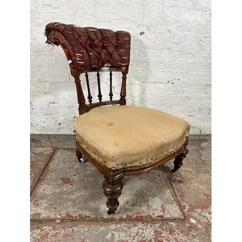 89 - A Victorian walnut and fabric upholstered nursing chair - approx. 80cm high x 56cm wide x 56cm deep