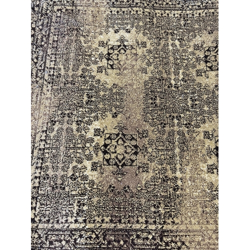 91 - A Plantation Rug Company brown rug - approx. 170cm x 117cm