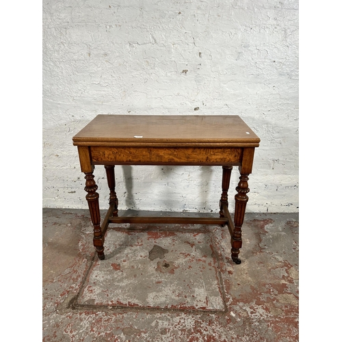 92 - A Simpson & Sons Halifax walnut rectangular games table - approx. 77cm high x 84cm wide x 44cm deep