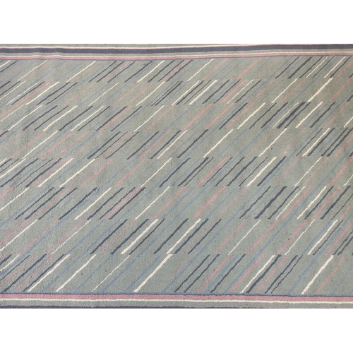 94 - A Belgian Fashion Wilton rug - approx. 290cm x 190cm