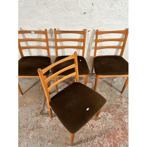 96 - A set of four Schreiber beech dining chairs with brown upholstery