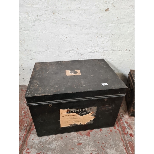 164 - Two early 20th century black painted steel deed boxes - largest approx. 42cm high x 62cm wide x 44cm... 