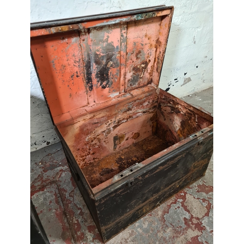 164 - Two early 20th century black painted steel deed boxes - largest approx. 42cm high x 62cm wide x 44cm... 