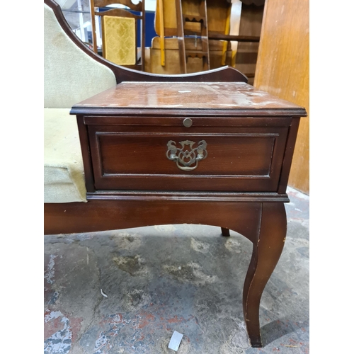 168 - A Chippy mahogany and fabric upholstered telephone seat