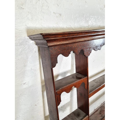 170A - A George III oak three tier dresser top - approx. 130cm high x 196cm wide x 20cm deep