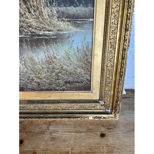 177 - A gilt framed oil on board of Canada geese in flight by H. Monahan - approx. 80cm high x 106cm wide