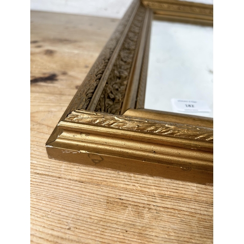 182 - An early 20th century gilt framed wall mirror - approx. 59cm high x 71cm wide