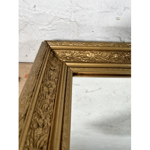 182 - An early 20th century gilt framed wall mirror - approx. 59cm high x 71cm wide