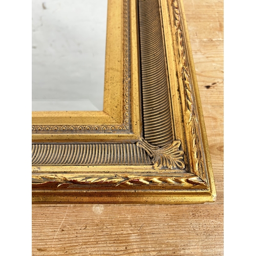 186 - A 19th century style gilt framed bevelled edge wall mirror - approx. 75cm high x 82cm wide