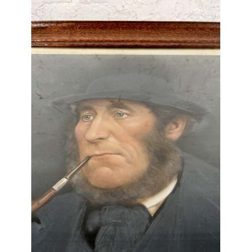 187 - An early 20th century oak framed oil on board portrait of a gentleman with pipe - approx. 62cm high ... 