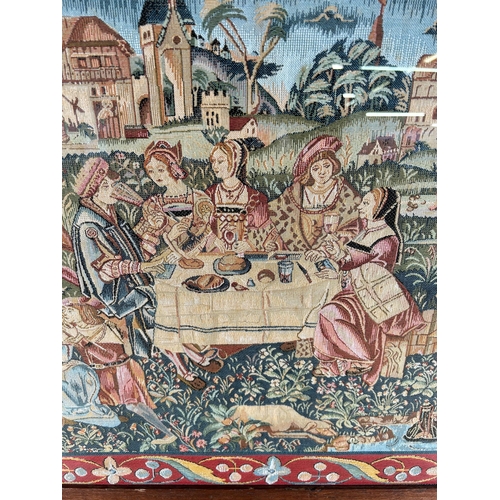 191 - A framed tapestry of a Medieval scene - approx. 72cm high x 90cm wide