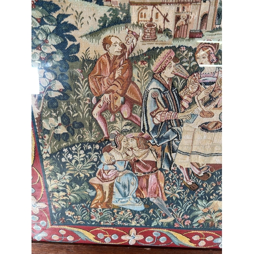 191 - A framed tapestry of a Medieval scene - approx. 72cm high x 90cm wide