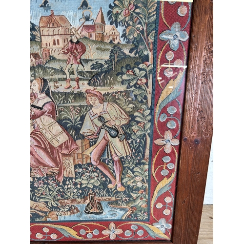 191 - A framed tapestry of a Medieval scene - approx. 72cm high x 90cm wide