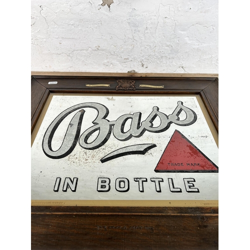 197 - An original early 20th century Bass & Co. Ltd. oak framed advertising mirror - approx. 47cm high x 5... 