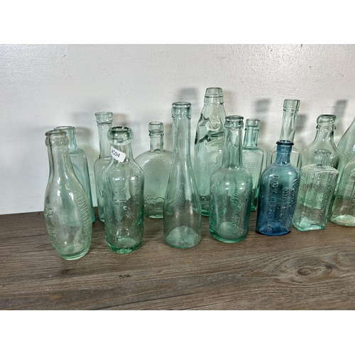 341 - Nineteen vintage glass bottles