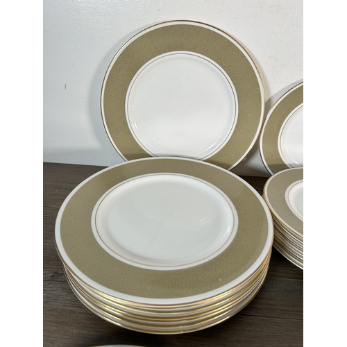 343 - A Royal Doulton Antique Gold bone china thirty three piece dinner service