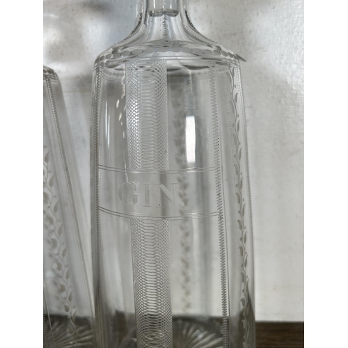 344 - Four vintage glass decanters - largest approx. 30cm high