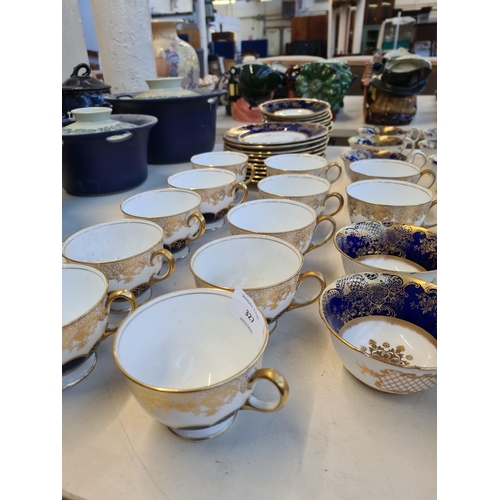 327 - Seventy six pieces of Aynsley cobalt blue and gold china