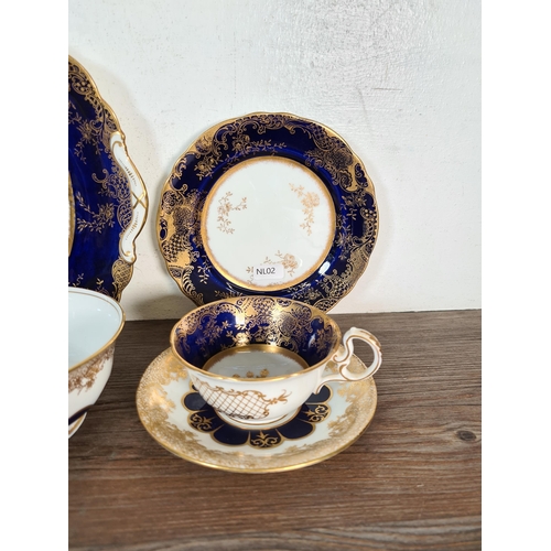 327 - Seventy six pieces of Aynsley cobalt blue and gold china