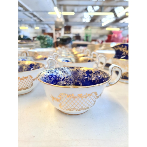 327 - Seventy six pieces of Aynsley cobalt blue and gold china