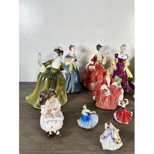 295 - Fifteen Royal Doulton figurines to include Storytime - HN 3695, My First Figurine - HN 3424, Adrienn... 