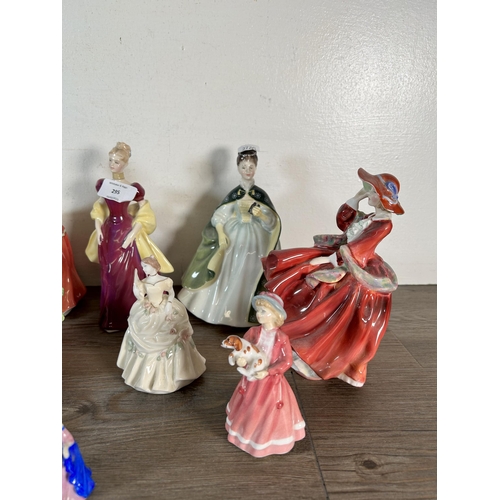 295 - Fifteen Royal Doulton figurines to include Storytime - HN 3695, My First Figurine - HN 3424, Adrienn... 