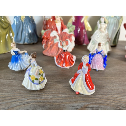 295 - Fifteen Royal Doulton figurines to include Storytime - HN 3695, My First Figurine - HN 3424, Adrienn... 