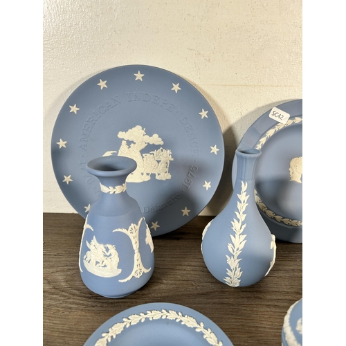 305 - Eleven pieces of Wedgwood Jasperware, three sage green and eight pale blue