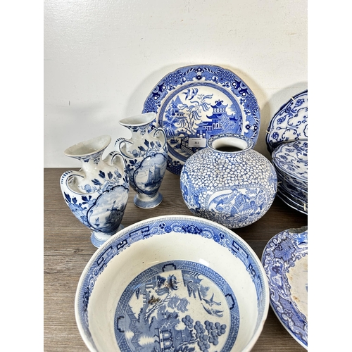 311 - A collection of blue and white china to include Adams baluster vase - Rd No. 623294, pair of Delft t... 