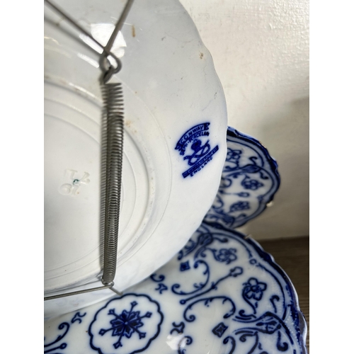 311 - A collection of blue and white china to include Adams baluster vase - Rd No. 623294, pair of Delft t... 