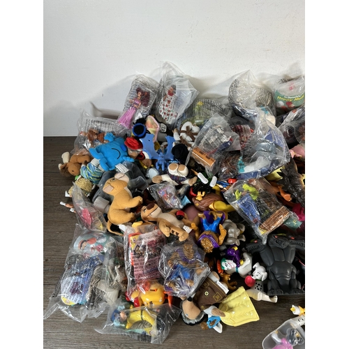 399 - A large collection of children's toys to include MGA Entertainment Bratz model vehicle, McDonalds to... 