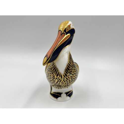 215 - A Royal Crown Derby Brown Pelican paperweight with gold stopper - approx. 13cm high