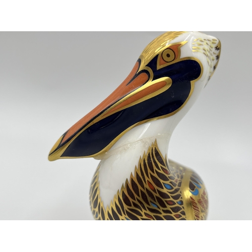 215 - A Royal Crown Derby Brown Pelican paperweight with gold stopper - approx. 13cm high