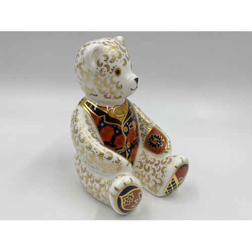 218 - A Royal Crown Derby Teddy Bear paperweight with gold stopper - approx. 11.5cm high