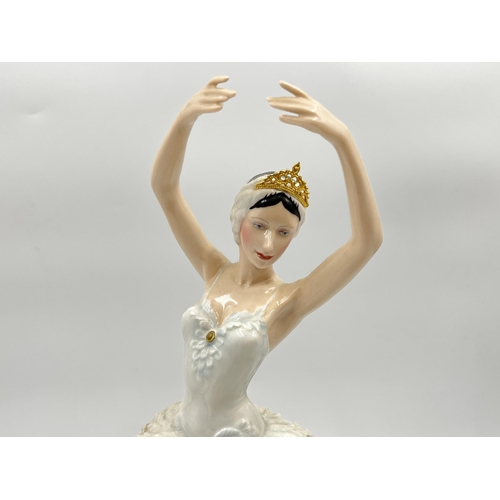 222 - A 1986 The Franklin Mint Swan Lake hand painted fine porcelain figurine by Ronald Van Ruyckevelt - a... 