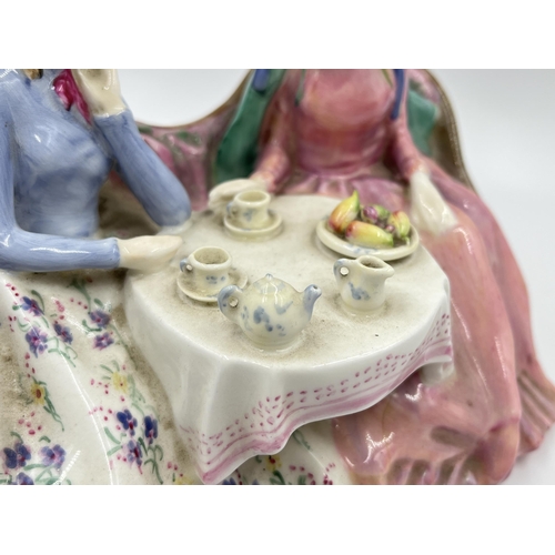 230 - A Royal Doulton Afternoon Tea figurine - HN 1747