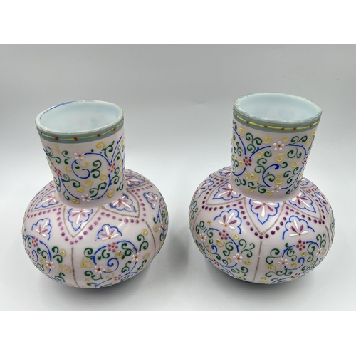 233 - A pair of late 19th/early 20th century hand paint milk glass vases - approx. 16cm high