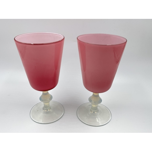 243 - A pair of mid 20th century Italian pink opaline glass wine goblets - approx. 16cm high