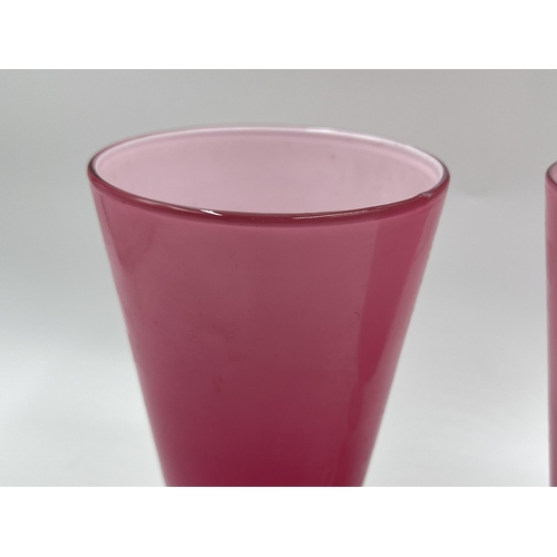 243 - A pair of mid 20th century Italian pink opaline glass wine goblets - approx. 16cm high